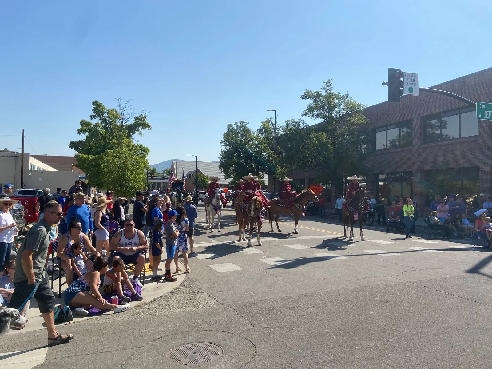 Caballeros riding horses in the Boise 4th of July parade.