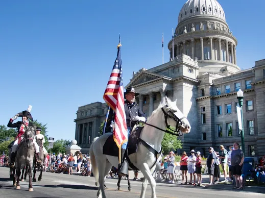 Mounted Calvary with Idaho Capitol in backgound